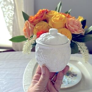 small canister, match stick holder, fruit, and flower decorated lid canister